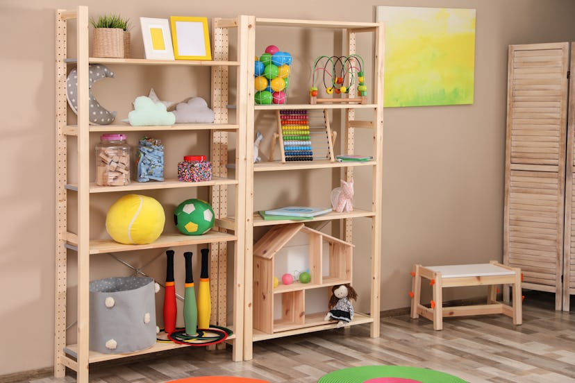 Storage for toys in colorful child's room. Idea for interior design
