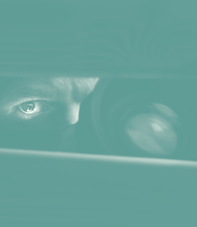 Spy Man. Peeping. Spying. Surveillance. Secret Information. Hidden Camera. Man hiding. Paparazzi. St...