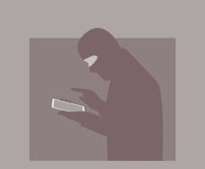 A professional fraudster uses a smartphone. The fraudster calls on a mobile phone. The concept of ph...