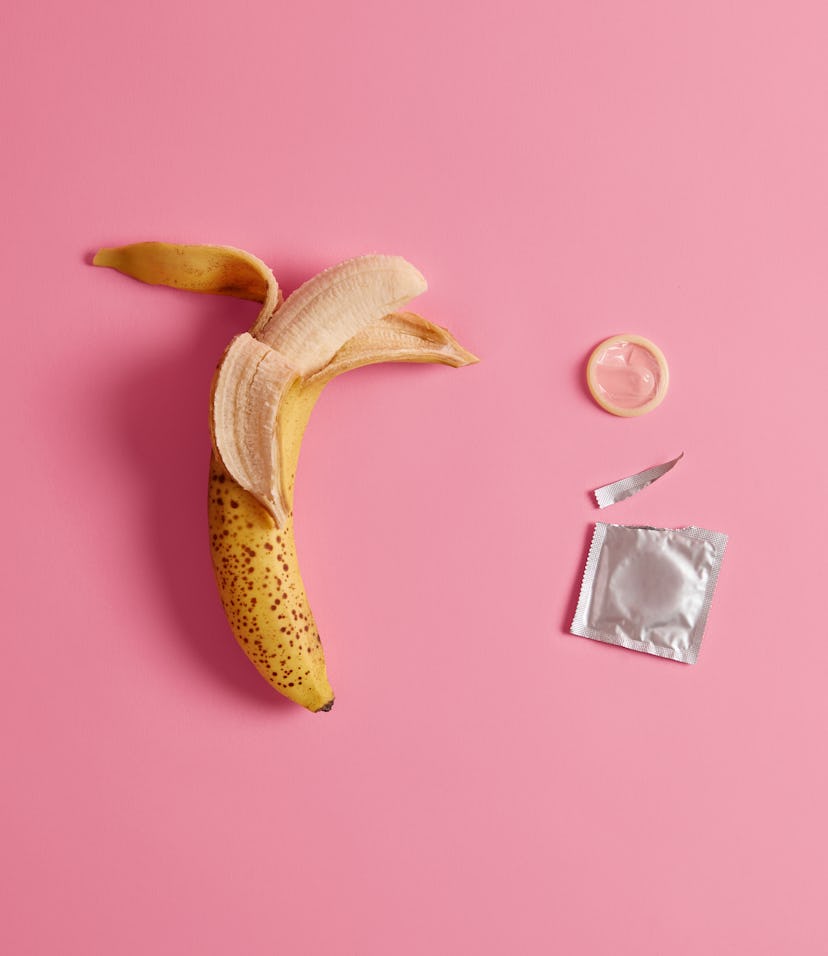 Condom tested on banana. Effective preventing pregnancy product for your safety. Unplanned parenthoo...