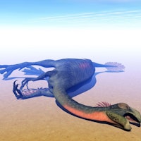 Gigantoraptor dinosaur lying dead in sunny and hot desert