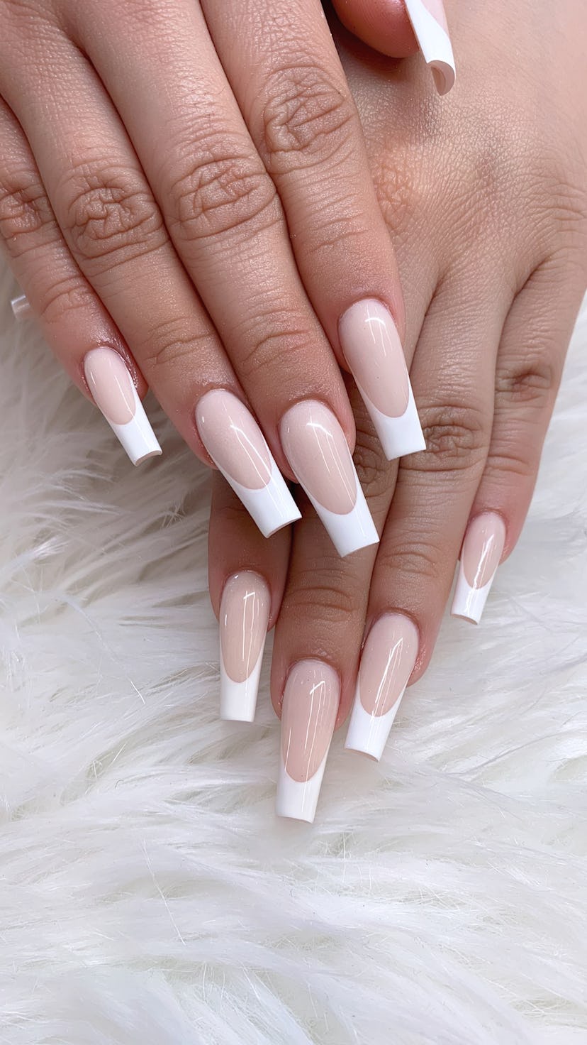 Modern French tip design nails. Pink and white nails. Artificial nail art