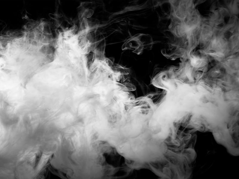 White smoke on a black background
