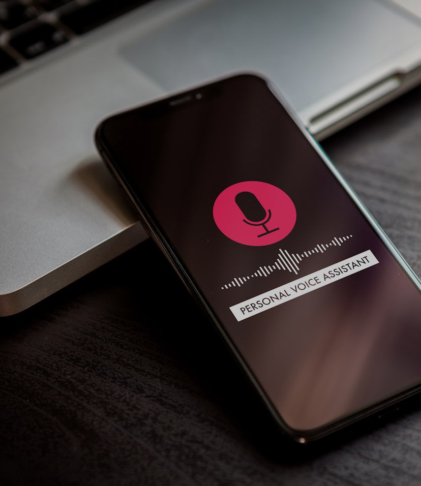 Personal assistant siri concept and voice recognition audio technology. Red button with microphone i...