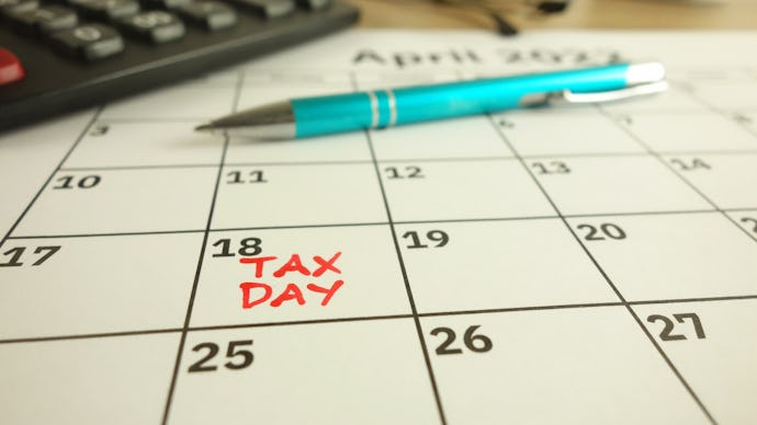 Tax payment day marked on a calendar - April 18, 2022, financial concept