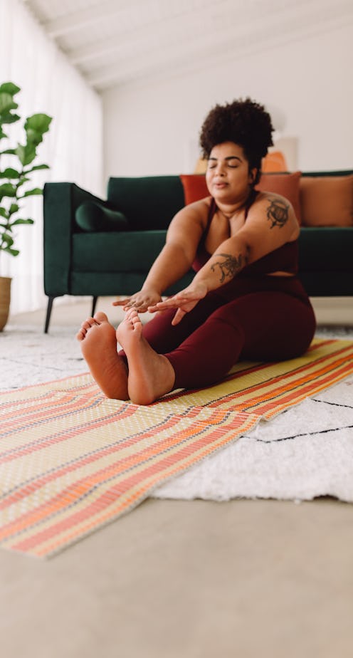 How to stretch your psoas muscles, according to trainers.