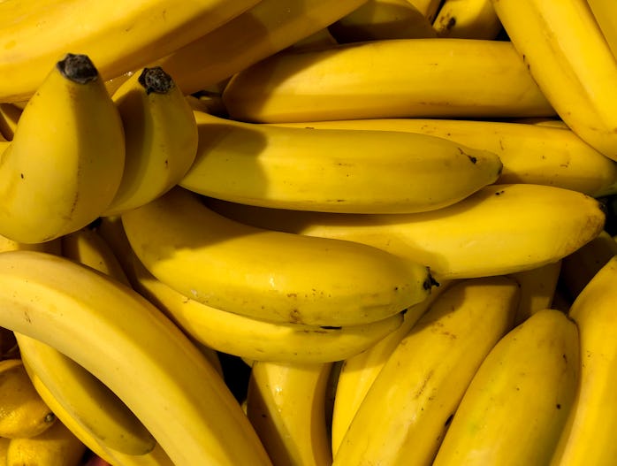 Macro photo food product yellow bananas. Stock photo Texture background tropical ripe fruit bananas....