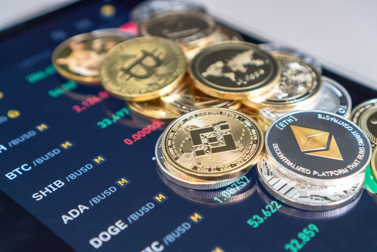 Cryptocurrency on Binance trading app, Bitcoin BTC with BNB, Ethereum, Dogecoin, Cardano, Litecoin, ...