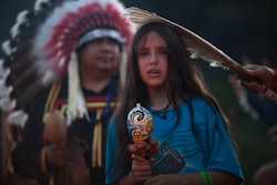 Xiuhtezcatl Martinez from Azteca tribe participates in the Sacred Fire Lighting Ceremony at the Kari...