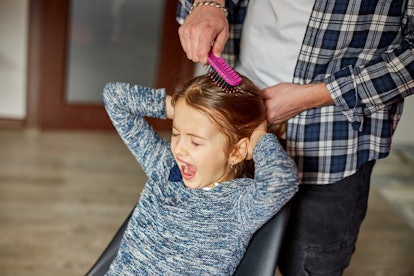 brushing children's hair is hard work for any parent