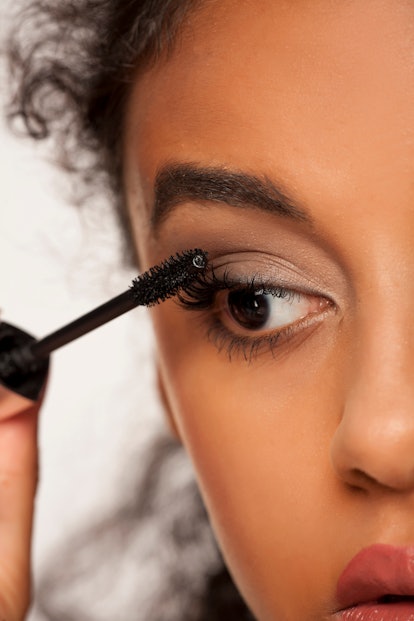Wondering how to make your straight eyelashes stay curled? Experts tell Bustle here.