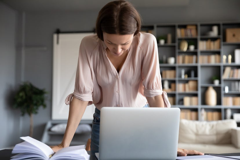 Try standing up at your desk to stretch your wrists.