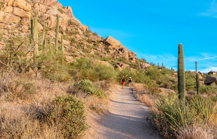 Wioman Hiking in Arizona, one of the best places to go on spring break.