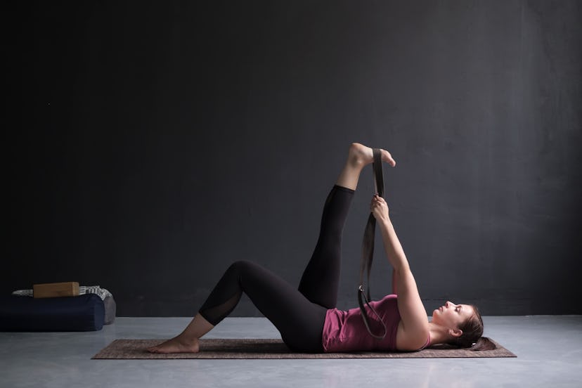 How to do a recline big toe pose to stretch your hamstrings.