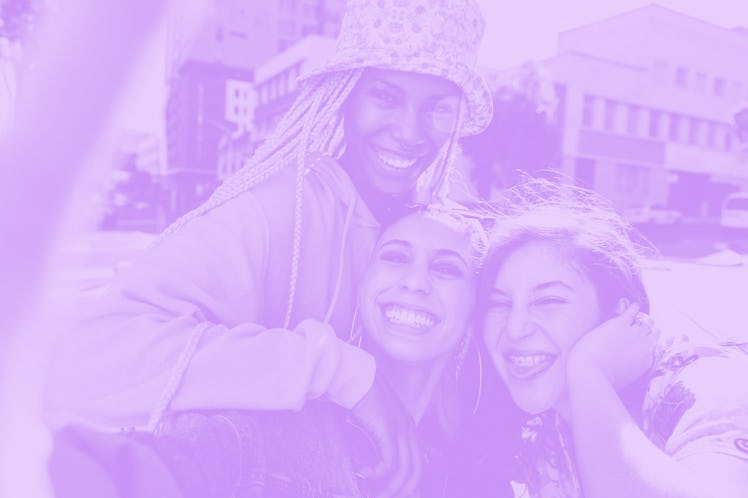 A group of friends taking a selfie, which they'll want to display in their dorm or apartment