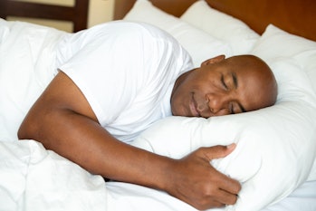 Portrait of a man getting a good nights sleep.