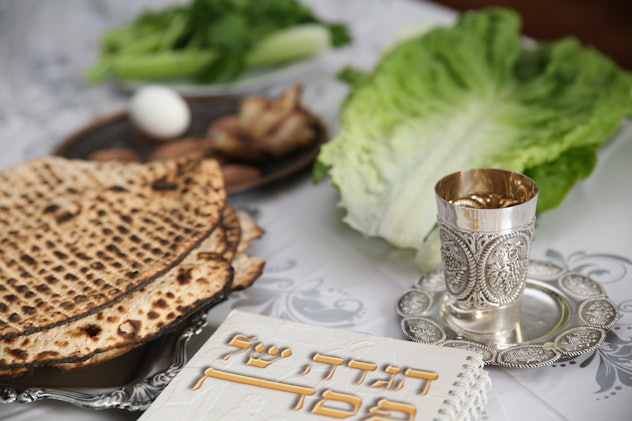 Table Ready For Traditional Seder Ritual during the Jewish holiday of Passover.
. (Kiddush cup, hagg...