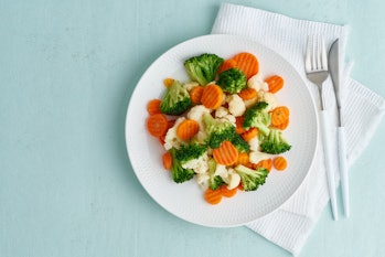 Mix of boiled vegetables. Broccoli, carrots, cauliflower. Steamed vegetables for dietary low-calorie...