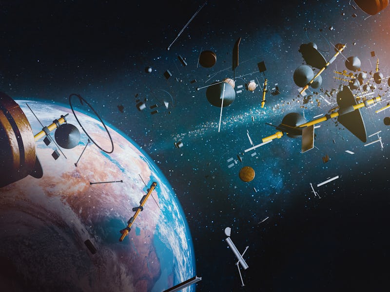 Aerial view of Earth surrounded by space junk from space ships and satellites; 3D; 3D Illustration