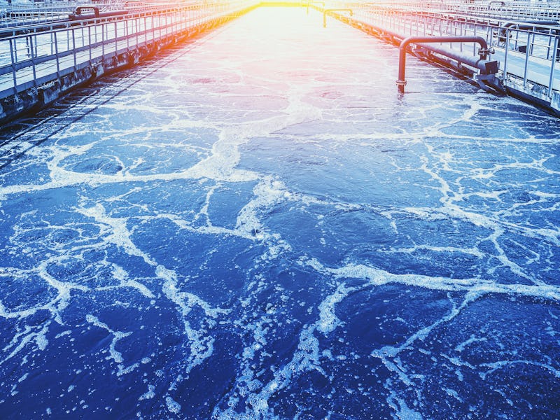 Water treatment tank with wastewater, aeration process in blue color