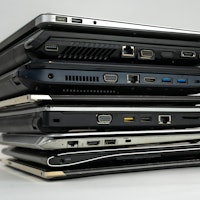 Stack of laptops on top of eachother.