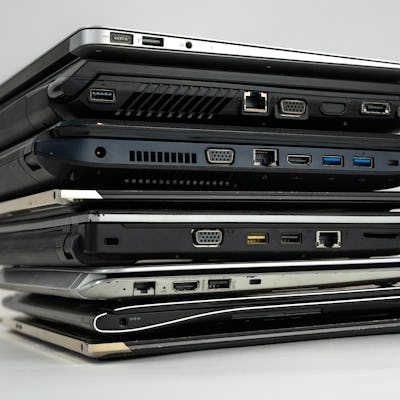 Stack of laptops on top of eachother.