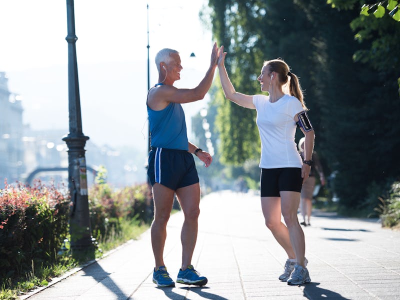 jogging friends couple congratulate and happy to finish their morning workout