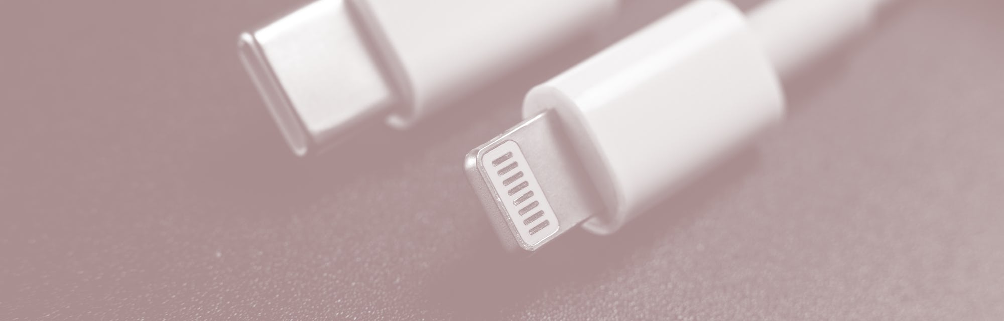 charging cables for phone on black background