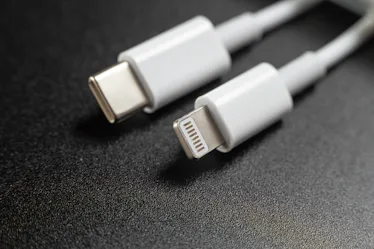 charging cables for phone on black background