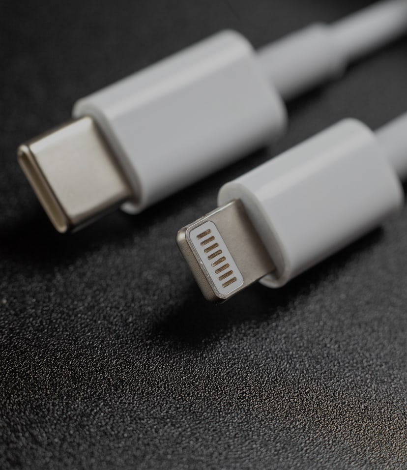 charging cables for phone on black background