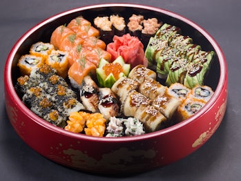 Platter with different kind of sushi rolls. Big Sushi set