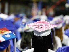 Graduates at a graduation in NJ use song lyrics for senior quotes from songs as well as graduation s...