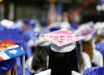 Graduates at a graduation in NJ use song lyrics for senior quotes from songs as well as graduation s...