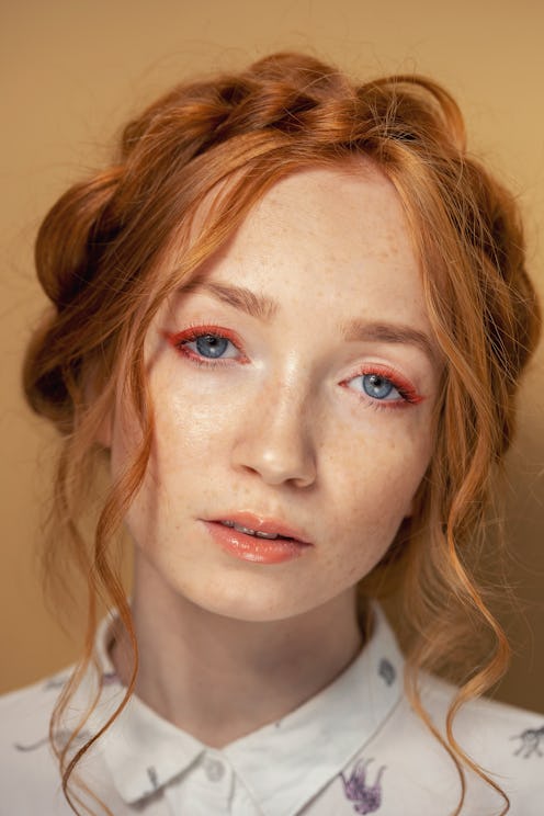 Red eyeliner is trending. How do you pull it off? Here are tips from professional makeup artists and...