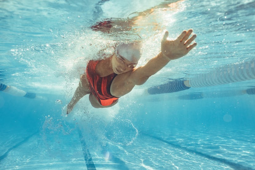Swimming uses all the muscles of the body, but particularly the lats and quads.