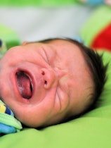 A baby cries. New research challenges the old idea that infant crying follows a pattern that peaks a...