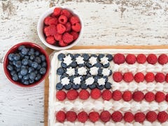 Patriotic, red white and blue, American flag cake is a sweet option for Memorial Day desserts.