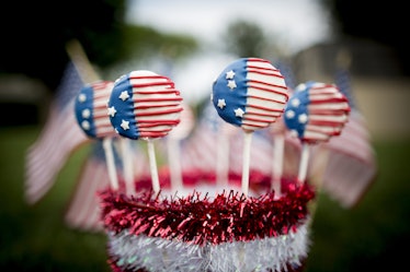 red white and blue cake pops are good for Memorial Day desserts.