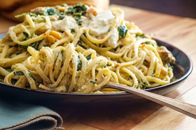 Linguine pasta with Italian sausage, chickpeas and broccolini in a creamy ricotta cheese sauce