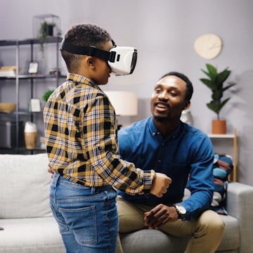 A teen using a VR headset. Meta has introduced enhanced parent controls for its Oculus Quest headset...