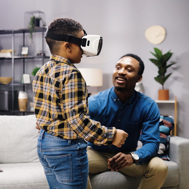 A teen using a VR headset. Meta has introduced enhanced parent controls for its Oculus Quest headset...
