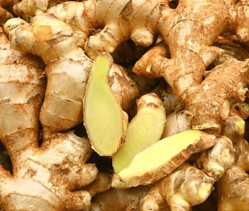 Ginger root and ginger slice. Fresh ginger root and ground ginger spice.