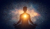 Man and soul. Yoga lotus pose meditation on nebula galaxy background. Zen, spiritual well-being. 3D ...