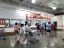 shoppers at costco store, is costco open on the fourth of july