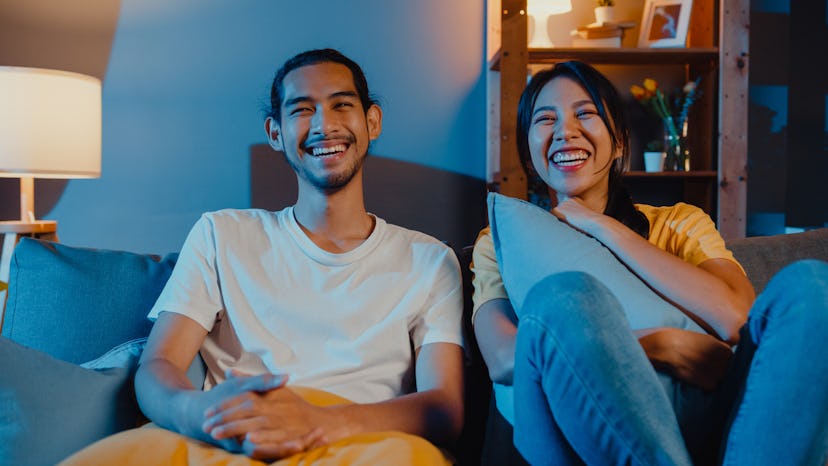 couple at the six month mark watching TV together
