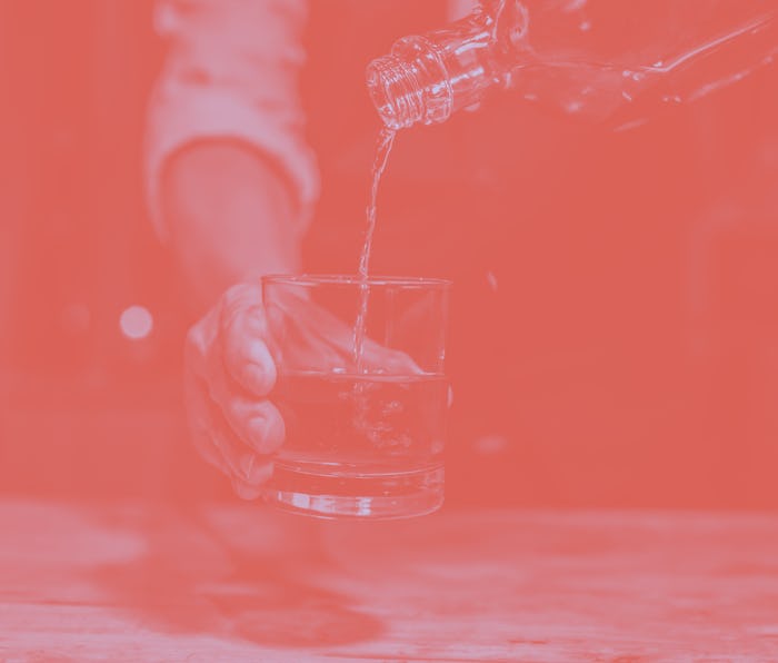 Barman pouring whiskey whiskey glass beautiful night