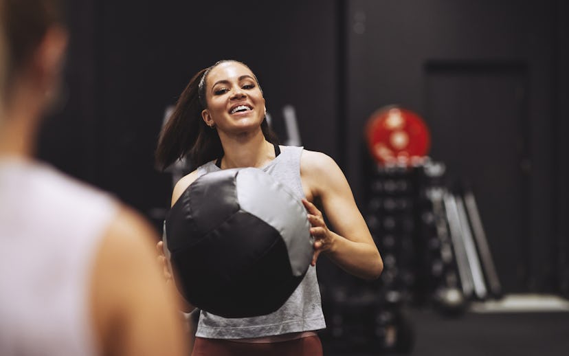 Push a medicine ball away from you with explosive power.