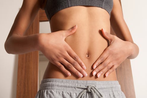 Why does my belly button smell? Docs explain the potential causes behind the funky odor.