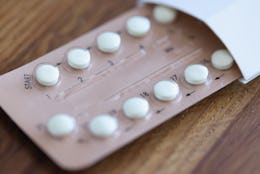 Women contraceptive hormonal birth control pills closeup