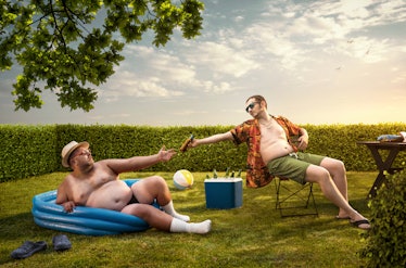 Two funny nerds relaxing in the backyard on the summer day